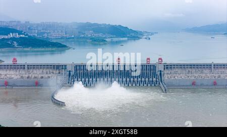 YICHANG, CHINA - JULY 10, 2024 - Photo taken on July 10, 2024 shows the Three Gorges Dam releasing flood water for the first time this year in Yichang Stock Photo