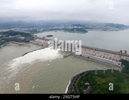 YICHANG, CHINA - JULY 10, 2024 - Photo taken on July 10, 2024 shows the Three Gorges Dam releasing flood water for the first time this year in Yichang Stock Photo