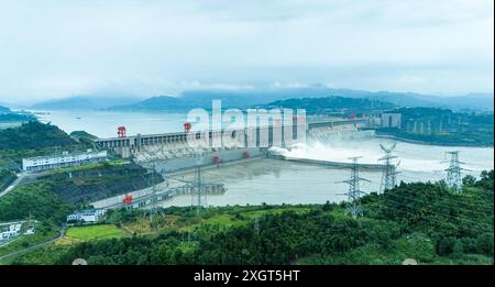 YICHANG, CHINA - JULY 10, 2024 - Photo taken on July 10, 2024 shows the Three Gorges Dam releasing flood water for the first time this year in Yichang Stock Photo