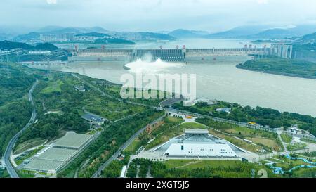 YICHANG, CHINA - JULY 10, 2024 - Photo taken on July 10, 2024 shows the Three Gorges Dam releasing flood water for the first time this year in Yichang Stock Photo