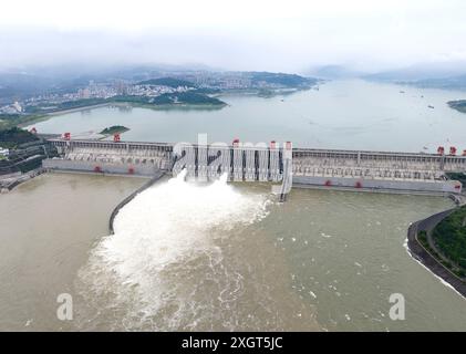 YICHANG, CHINA - JULY 10, 2024 - Photo taken on July 10, 2024 shows the Three Gorges Dam releasing flood water for the first time this year in Yichang Stock Photo