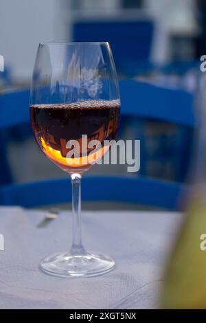 Glass of rose wine in the restaurant Stock Photo