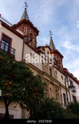 Two bell towers of Church of the Hospital de la Paz at Plaza del Salvador in Seville, Spain Stock Photo