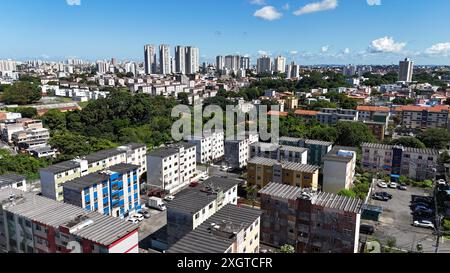 salvador, bahia, brazil - june 29, 2024: aerial view of houses in a favela area and residential buildings in the city of Salvador. Stock Photo