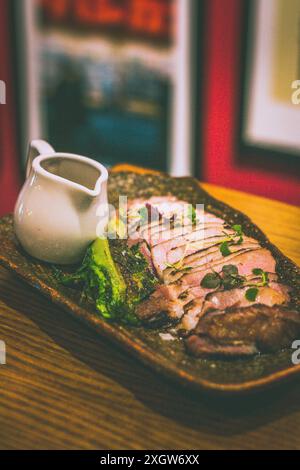 Grilled IBERICO PORK RIBEYE with white miso and gem lettuce Stock Photo ...