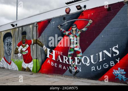 Port Talbot, Wales. 6 July 2024. A mural of the Aberavon Harlequins RFC badge and rugby player Regan Grace outside the clubhouse at Aberavon Harlequins RFC in Port Talbot, Wales, UK on 6 July 2024. Credit: Duncan Thomas/Majestic Media. Stock Photo