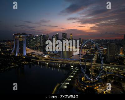 Aerial view of sunset at Marina Bay Singapore city skyline Stock Photo ...