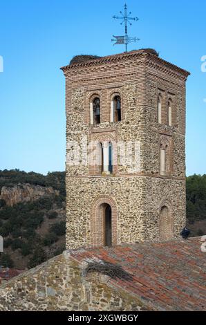 Bell tower of the Church of Santa María del Castillo from the castle walls, Buitrago de Lozoya, Madrid, Spain Stock Photo