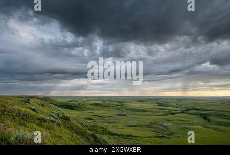 Storm clouds over the Valley of 1000 Devils in Grasslands National Park, Saskatchewan, Canada Stock Photo