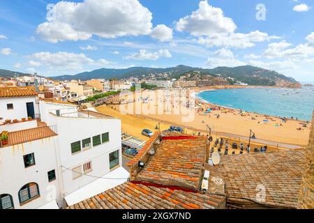 View from the medieval Murallas de Tossa de Mar fortified castle of the sandy beach and whitewashed town of Tossa de Mar, Spain, Costa Brava coast. Stock Photo