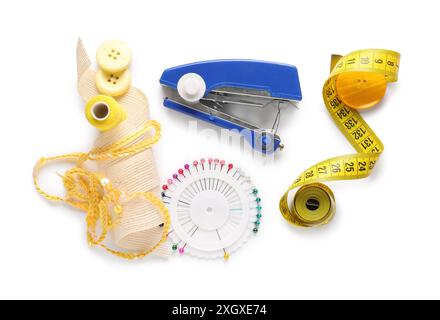 Manual sewing machine with set of tailor's supplies isolated on white background Stock Photo