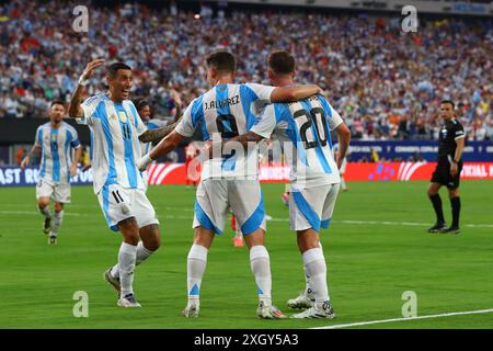 Argentina's forward Julian Alvarez (C) celebrates with teammates after scoring a goal against Canada during the Copa América USA 2024 semifinal match, at MetLife Stadium in New Jersey, on July 9, 2024. Stock Photo