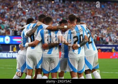 Argentina's forward Julian Alvarez (C) celebrates with teammates after scoring a goal against Canada during the Copa América USA 2024 semifinal match, at MetLife Stadium in New Jersey, on July 9, 2024. Stock Photo