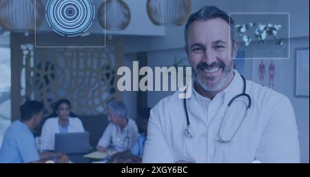 Image of data processing over diverse doctors smiling. Global medicine and digital interface concept digitally generated image. Stock Photo