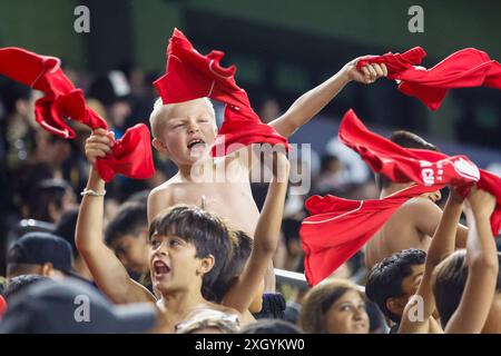 Los Angeles, United States. 10th July, 2024. Young Los Angeles FC fans seen cheering during the U.S. Open Cup quarter final match between Los Angeles FC and New Mexico United at BMO Stadium. Final score; Los Angeles FC 3:1 New Mexico United. Credit: SOPA Images Limited/Alamy Live News Stock Photo