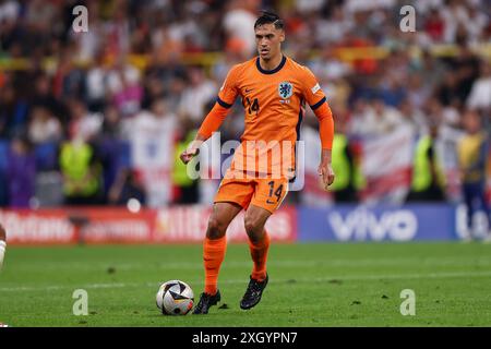 Dortmund, Germany. 10th July, 2024. Ezri Konsa of England seen in action during the UEFA EURO 2024 match between Netherlands and England at Signal Iduna Park (Dortmund).Final score: Full time, Netherlands 1:2 England. Credit: SOPA Images Limited/Alamy Live News Stock Photo