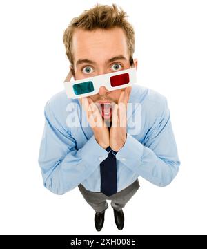Business, man and surprised with 3D glasses for film, movie premiere and red or blue lens in studio. Media professional, shocked and wow portrait with Stock Photo