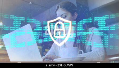 Image of padlock in shield, numbers in blockchain, connected dots, caucasian woman using laptop. Digital composite, multiple exposure, cryptocurrency, Stock Photo