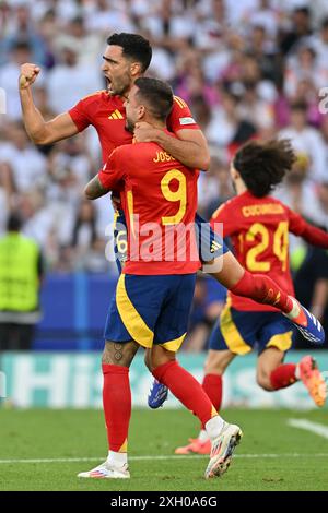 Mikel Merino (6) of Spain and Joselu (Jose Luis Mato Sanmartin)(9) of Spain celebrate during a soccer game between the national teams of Spain and Germany in the Quarter Final stage of the UEFA Euro 2024 tournament , on Thursday 5 July 2024  in Stuttgart , Germany . PHOTO SPORTPIX | David Catry Stock Photo