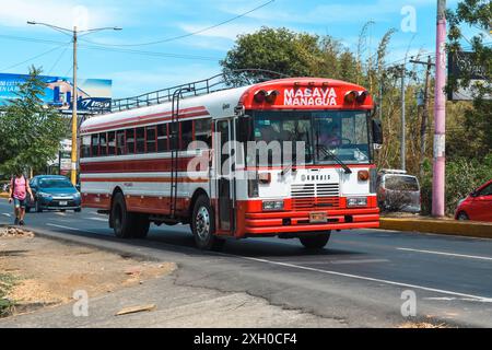 Granada, Nicaragua - March 24, 2019: Colorful local bus en route to Managua. Stock Photo