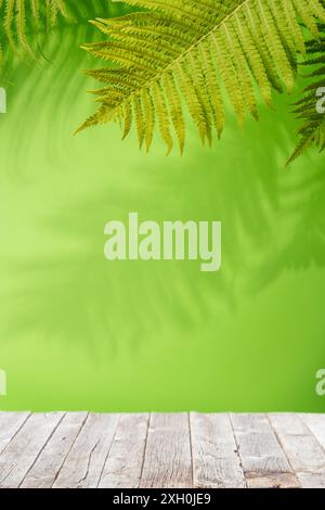 Template with empty table and wall with leaves shadow, perfect for product presentation and mockup Stock Photo