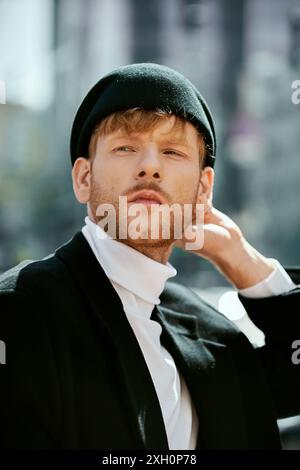 Red-haired man in debonair attire posing confidently. Stock Photo