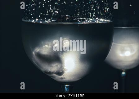 White wine with ice in wineglass, closeup Stock Photo