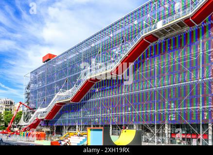 Facade of the Centre Pompidou art gallery complex with new  exterior red, blue, green pixelated dot mesh LEDs sponsored by Nike - Paris 75004, France. Stock Photo