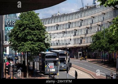 Ringway Centre, a classic of Brutalist architecture which is due to be demolished to make way for flats on 24th June 2024 in Birmingham, United Kingdom. Ringway Centre is a Grade B locally listed building located on Smallbrook Queensway in the city centre. The six-storey, 230 metres long building was designed by architect James Roberts as part of the Inner Ring Road scheme in the 1950s and is notable for its gentle sweeping curved frontal elevation. In July 2016, the building was refused listed status by Historic England which enables redevelopment to take place. Stock Photo