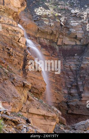 Waterfall in the Bletterbach gorge near Bolzano, South Tyrol Stock Photo