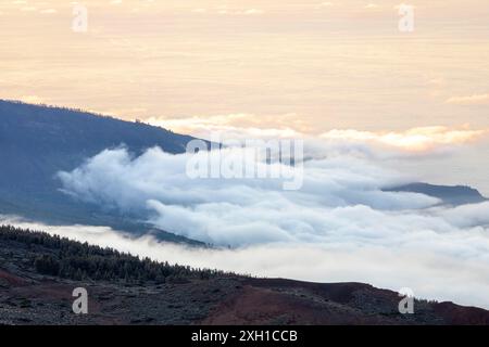 Trade wind clouds on the slopes of Mount Teide on Tenerife after sunset Stock Photo