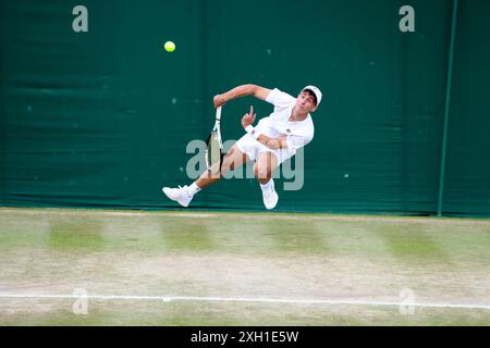 Wimbledon, London, UK. 1st July, 2024. Theo Papamalamis of France serving to his opponent Frederic Cina of Italy, during the boys singles competition at Wimbledon today. Credit: Adam Stoltman/Alamy Live News Stock Photo