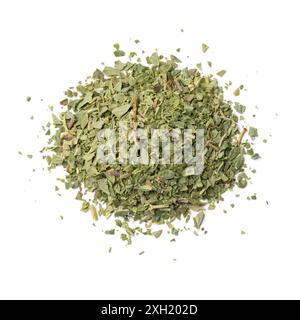 Heap of dried chopped oregano as an ingredient isolated on white background close up Stock Photo