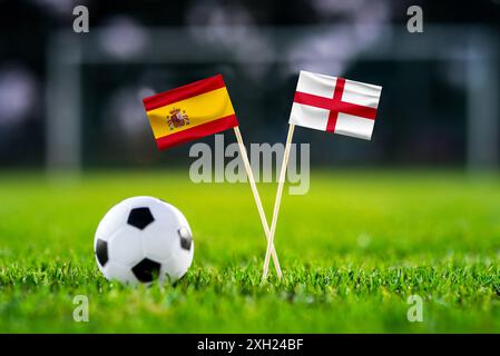 Spain vs England and football ball on green grass. Final of Europa Football tournament in Berlin on 14. july 2024 Stock Photo