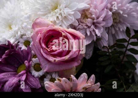 A close up closeup of a bouquet of old decaying flowers in the UK. Stock Photo