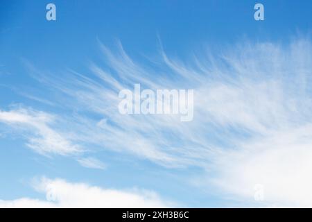 Cirrocumulus white clouds in the blue sky background, sky only Stock Photo
