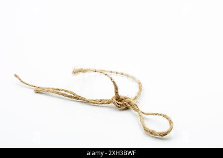 Thick felt rope tied in a noose closeup on a white. Stock Photo