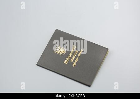 Military ID reserve officer of the armed forces of Ukraine, closeup on white. Stock Photo