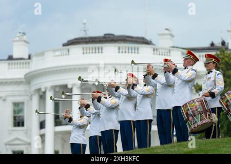 Washington, United States. 10th July, 2024. Herald trumpeters announce the arrival of European leaders and their spouses during the arrival ceremony for the Gala Dinner marking the 75th anniversary NATO Summit on the South Lawn of the White House, July 10, 2024 in Washington, DC Credit: Oliver Contreras/White House Photo/Alamy Live News Stock Photo