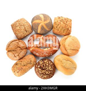 Different delicious buns and pretzel on white background Stock Photo