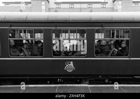 Loughborough (Great Central Railway) passengers on board preserved railcar 79900 Iris during an rail enthusiasts event Stock Photo