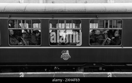 Loughborough (Great Central Railway) passengers on board preserved railcar 79900 Iris during an rail enthusiasts event Stock Photo