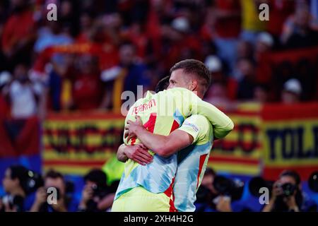 Dani Olmo and Ferran Torres  seen celebrating after goal during UEFA Euro 2024 game between national teams of Albania and Spain at Merkur Spiel-Arena, Stock Photo