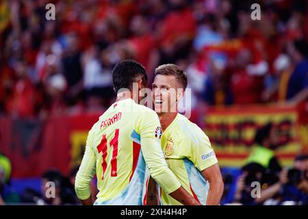 Dani Olmo and Ferran Torres  seen celebrating after goal during UEFA Euro 2024 game between national teams of Albania and Spain at Merkur Spiel-Arena, Stock Photo