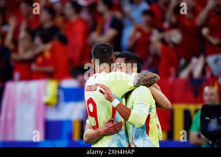 Joselu and Ferran Torres  seen celebrating after goal during UEFA Euro 2024 game between national teams of Albania and Spain at Merkur Spiel-Arena, Du Stock Photo