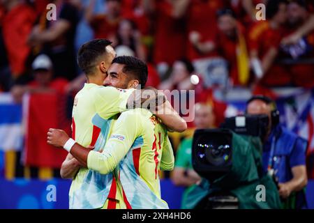 Joselu and Ferran Torres  seen celebrating after goal during UEFA Euro 2024 game between national teams of Albania and Spain at Merkur Spiel-Arena, Du Stock Photo