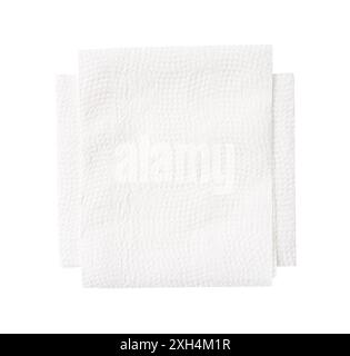 Top view of white folded tissue paper in stack is isolated on white background with clipping path. Stock Photo