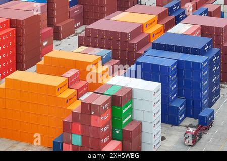 NANJING, CHINA.12th JULY 2024.Aerial view of containers sitting stacked at Longtan port on the bank of the Yangtze River on July 12, 2024 in Nanjing, Jiangsu Province of China. China's total goods imports and exports expanded 6.1 percent year-on-year in the first half of this year to 21.17 trillion yuan ($2.91 trillion), hitting a recording high, data from the General Administration of Customs showed on July 12.Credit: Yang Bo/China News Service/Alamy Live News Stock Photo