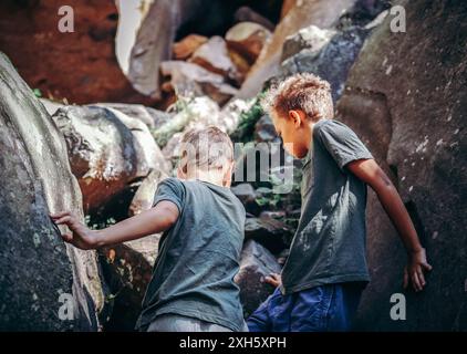 Two boys playing on the planet Earth Stock Photo