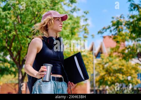 Student walking on university campus Stock Photo